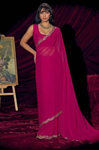 Rani color pure georgette zircon handwork border saree