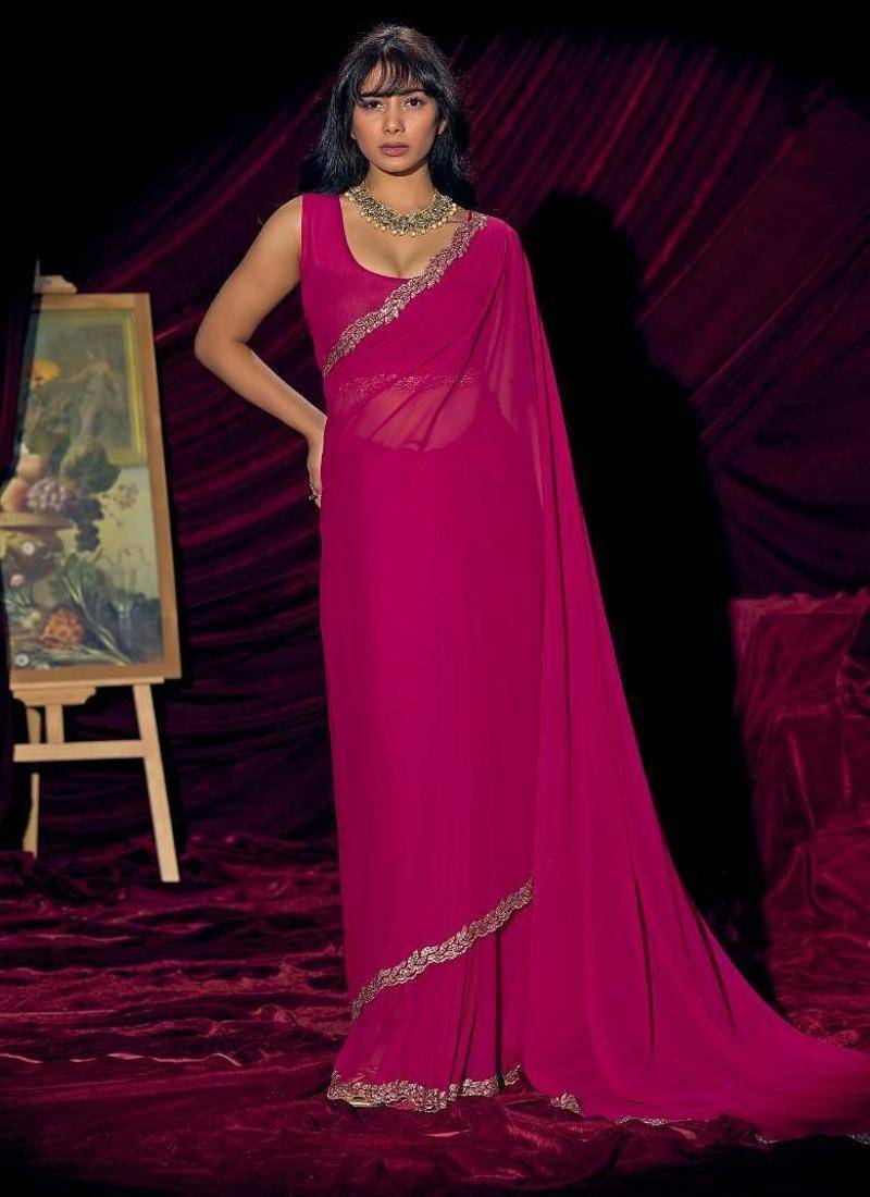 Rani color pure georgette zircon handwork border saree