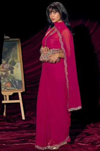Rani color pure georgette zircon handwork border saree