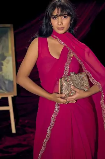 Rani color pure georgette zircon handwork border saree