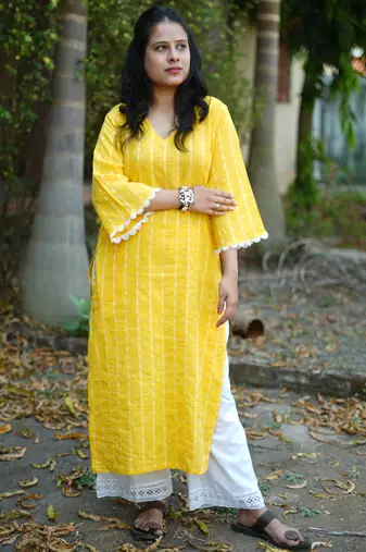 yellow cotton kurti pant set with kantha work design