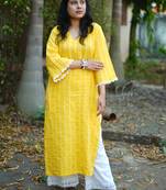 yellow cotton kurti pant set with kantha work design