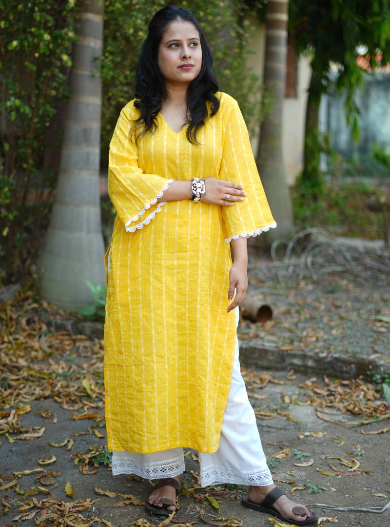 yellow cotton kurti pant set with kantha work design
