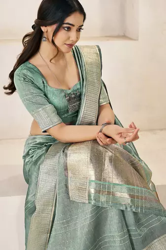Soft linen cotton silk blend saree with gold zari weaving