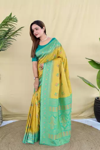 yellow silk saree with traditional motif and woven design