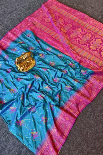 sky silk saree with motif weaving and contrast border