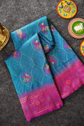 sky silk saree with motif weaving and contrast border