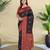 Black silk saree featuring elegant traditional motifs all over the saree with contrast blouse