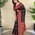 Black silk saree featuring elegant traditional motifs all over the saree with contrast blouse