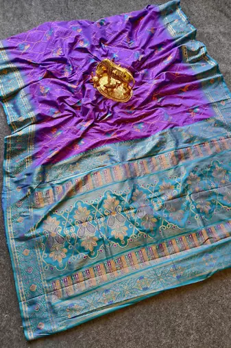 purple silk saree with traditional motif weaving design