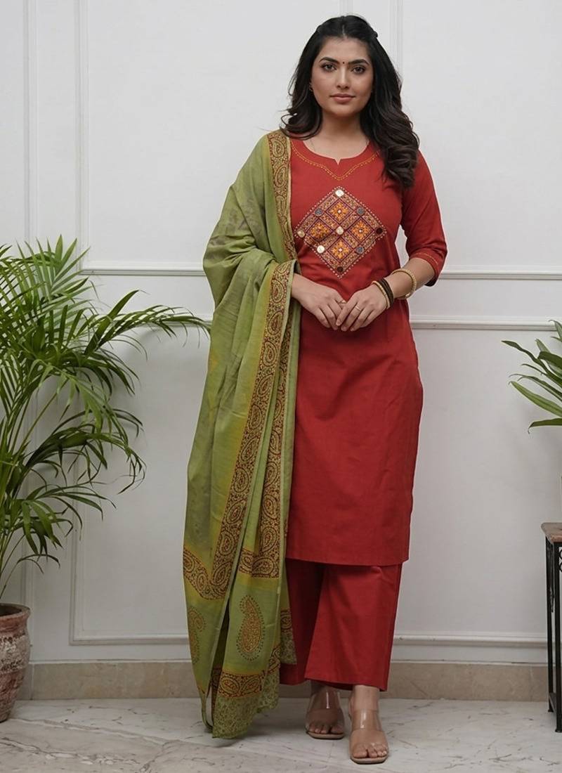 Beautiful jaipuri rust straight embroidered kurta set with pants and a dupatta.