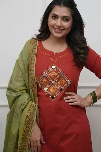 Beautiful jaipuri rust straight embroidered kurta set with pants and a dupatta.