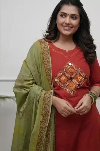 Beautiful jaipuri rust straight embroidered kurta set with pants and a dupatta.