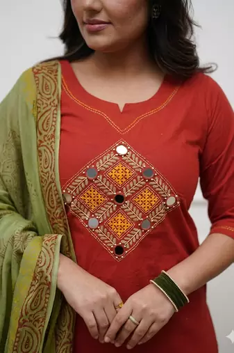 Beautiful jaipuri rust straight embroidered kurta set with pants and a dupatta.