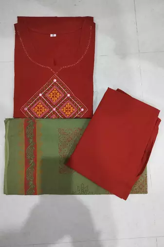 Beautiful jaipuri rust straight embroidered kurta set with pants and a dupatta.