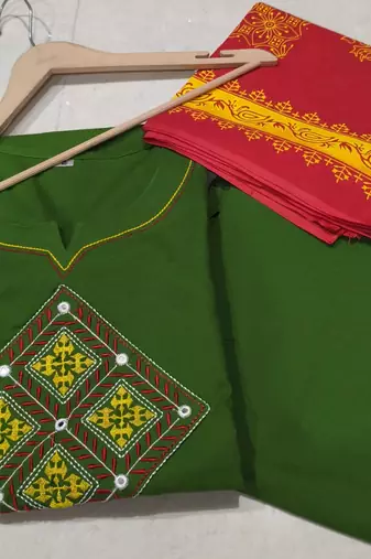 Beautiful jaipuri green straight embroidered kurta set with pants and a dupatta.