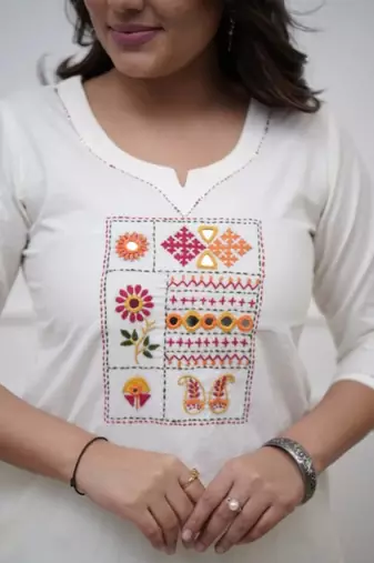 Beautiful jaipuri white straight embroidered kurta set with pants and a dupatta.