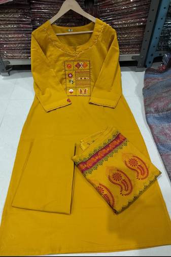 Beautiful jaipuri mustard straight embroidered kurta set with pants and a dupatta.