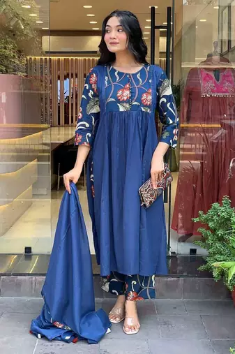 Beautiful jaipuri a blue colored cotton anarkali kurta set with printed trousers and a solid blue dupatta.