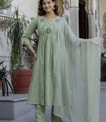 Beautiful jaipuri a green pure cotton kurta set with a floral yoke design and aari work detailing.