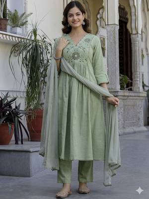 Beautiful jaipuri a green pure cotton kurta set with a floral yoke design and aari work detailing. 2