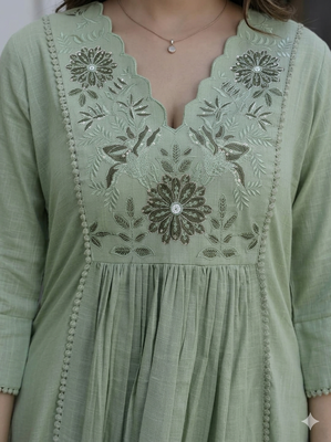 Beautiful jaipuri a green pure cotton kurta set with a floral yoke design and aari work detailing. 4