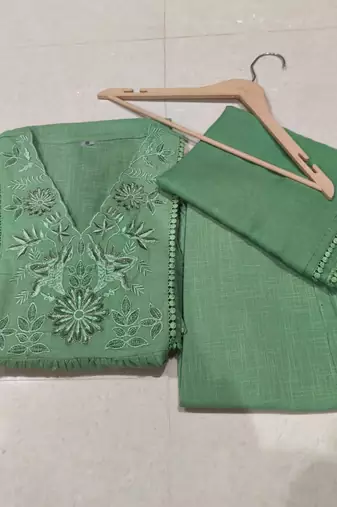 Beautiful jaipuri a green pure cotton kurta set with a floral yoke design and aari work detailing.