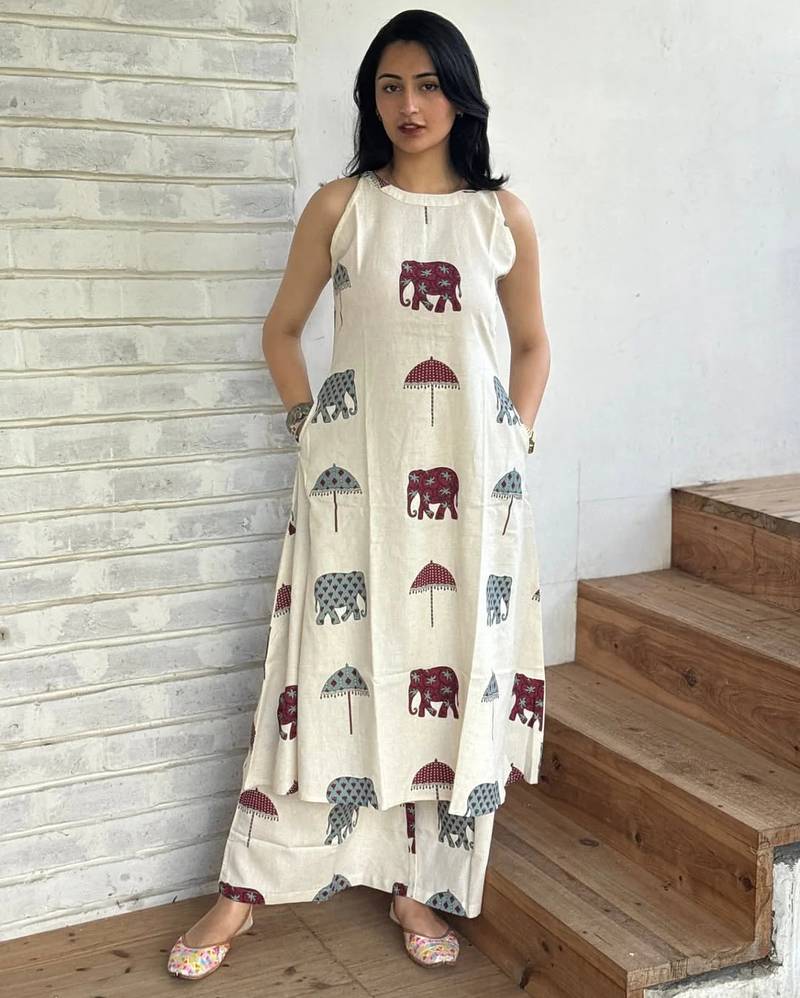 Beautiful jaipuri off-white a-line maroon and grey elephant and umbrella block prints kurta with wide leg palazzos.