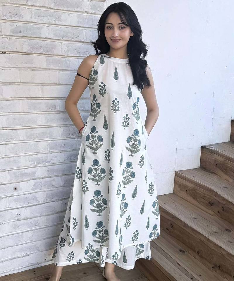 Beautiful jaipuri a white leaf & floral-printed a-line kurta with palazzo set.