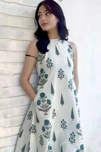 Beautiful jaipuri a white leaf & floral-printed a-line kurta with palazzo set.