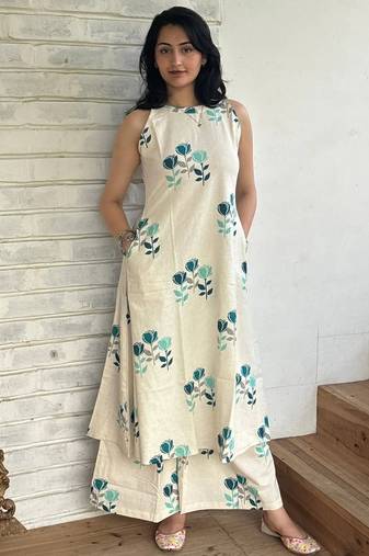 Beautiful jaipuri off-white a-line  with a teal and light green floral block print kurta with wide leg palazzos.