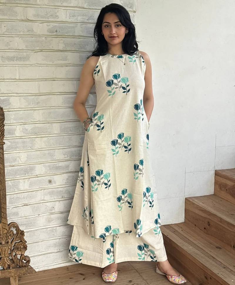 Beautiful jaipuri off-white a-line  with a teal and light green floral block print kurta with wide leg palazzos.