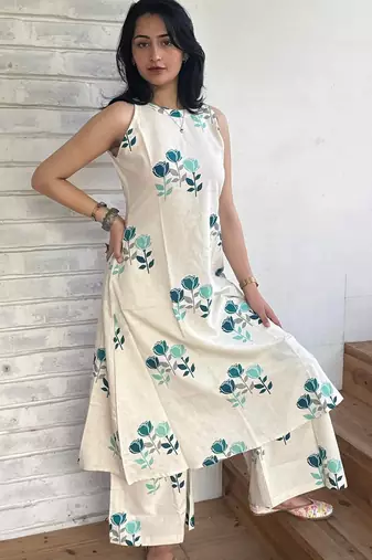 Beautiful jaipuri off-white a-line  with a teal and light green floral block print kurta with wide leg palazzos.
