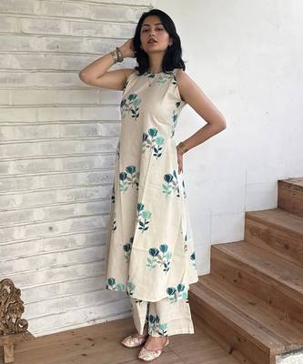 Beautiful jaipuri off-white a-line  with a teal and light green floral block print kurta with wide leg palazzos. 3