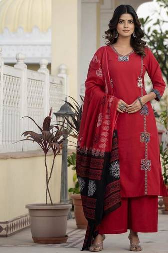 Beautiful jaipuri a red cotton straight kurta set adorned with traditional patch work and hand katha work.