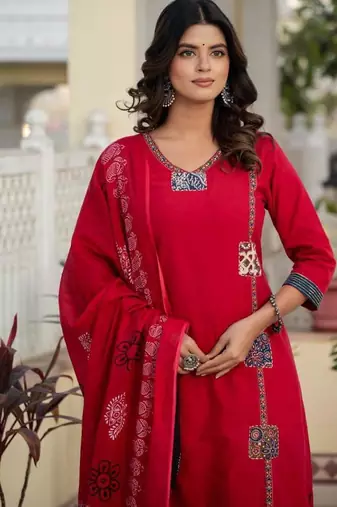 Beautiful jaipuri a red cotton straight kurta set adorned with traditional patch work and hand katha work.