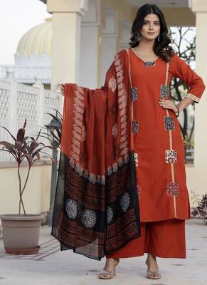 Beautiful jaipuri a mustard cotton straight kurta set adorned with traditional patch work and hand katha work. 1