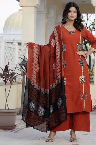 Beautiful jaipuri a mustard cotton straight kurta set adorned with traditional patch work and hand katha work.