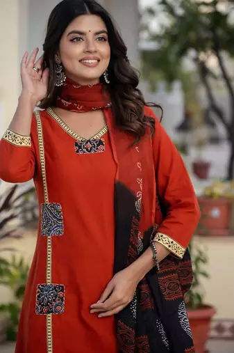 Beautiful jaipuri a mustard cotton straight kurta set adorned with traditional patch work and hand katha work.