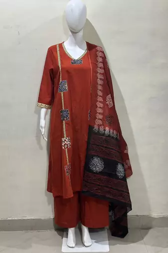 Beautiful jaipuri a mustard cotton straight kurta set adorned with traditional patch work and hand katha work.