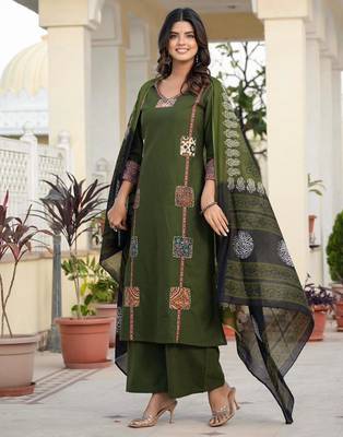Beautiful jaipuri a dark green cotton straight kurta set adorned with traditional patch work and hand katha work. 1