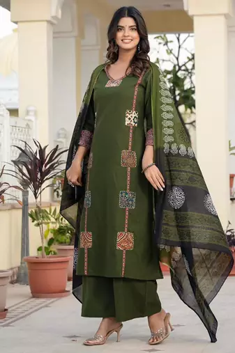 Beautiful jaipuri a dark green cotton straight kurta set adorned with traditional patch work and hand katha work.