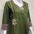 Beautiful jaipuri a dark green cotton straight kurta set adorned with traditional patch work and hand katha work.