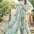 Women off white tropical leaf printed flared maxi dress