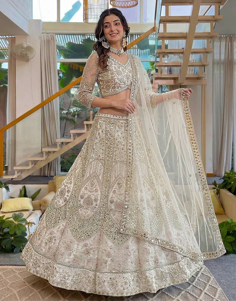 off-white net lehenga with cording and sequins work