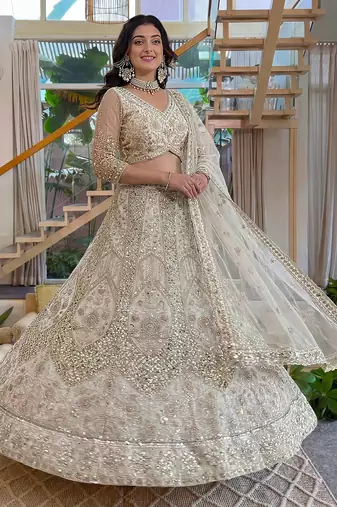 off-white net lehenga with cording and sequins work