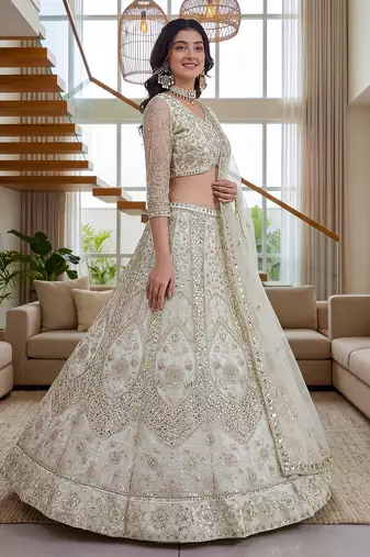 off-white net lehenga with cording and sequins work