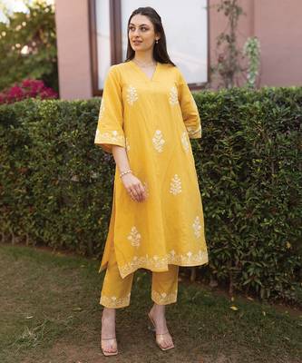 yellow linen straight kurta suit set with floral embroidery 1