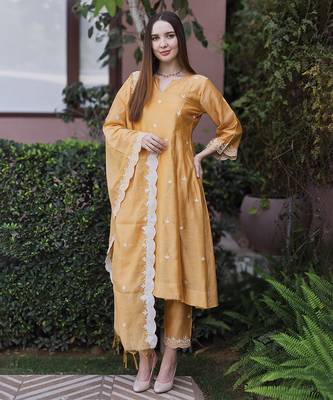 mustard yellow chanderi straight suit set with fine embroidery
 1