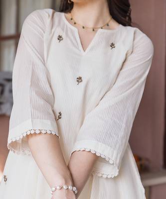 off white cotton straight suit set with subtle embroidery 3